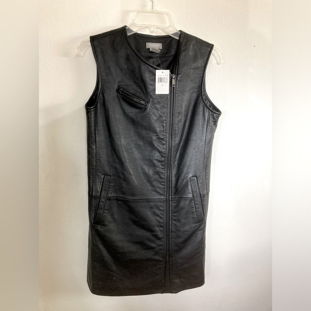Brand new sleeveless, long leather vest/dress.